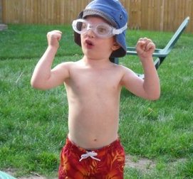 a photo of my grandson celebrating the swim